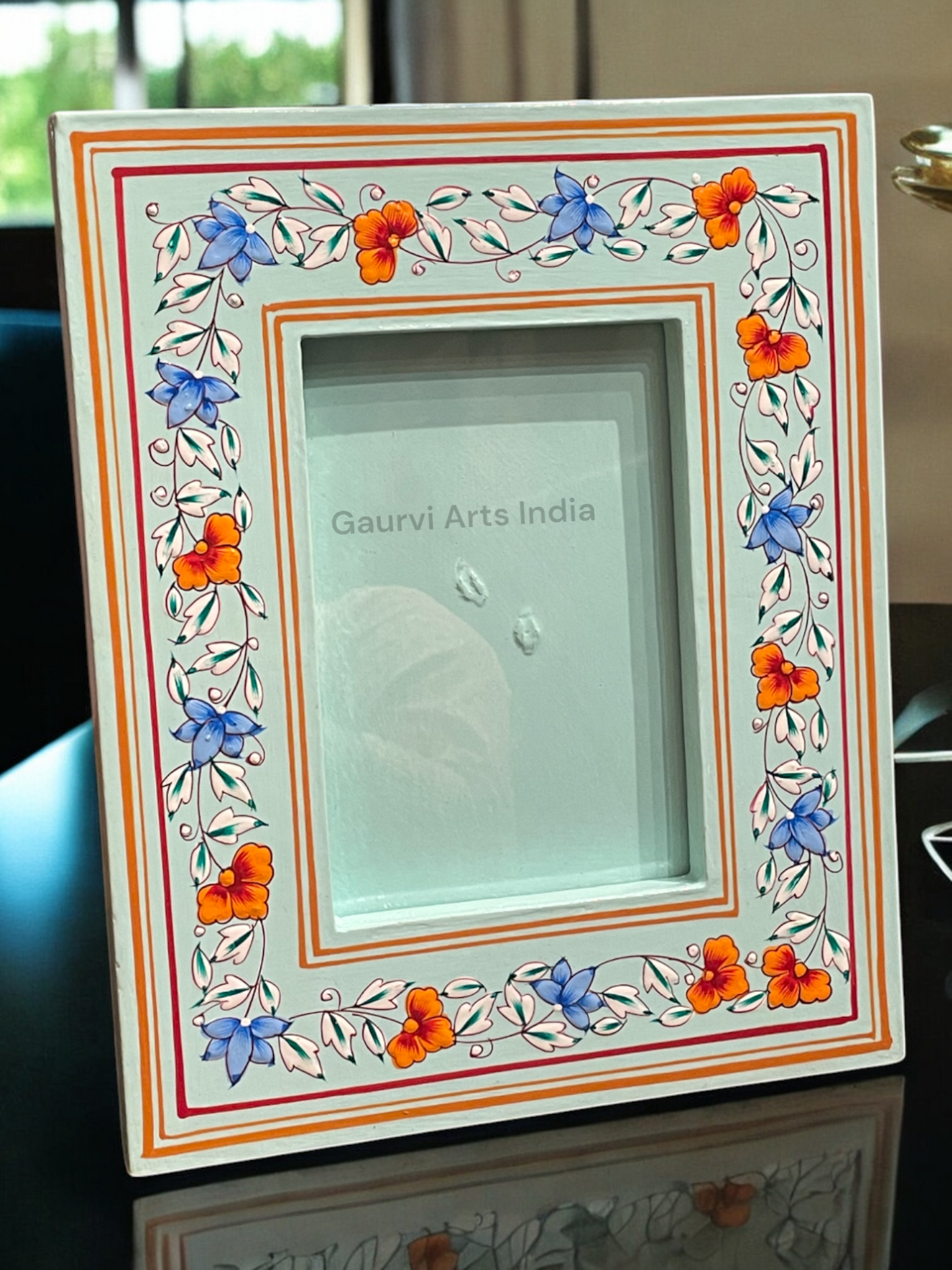 Hand-painted wooden photo frame adds a warm, artistic touch to your cherished memories