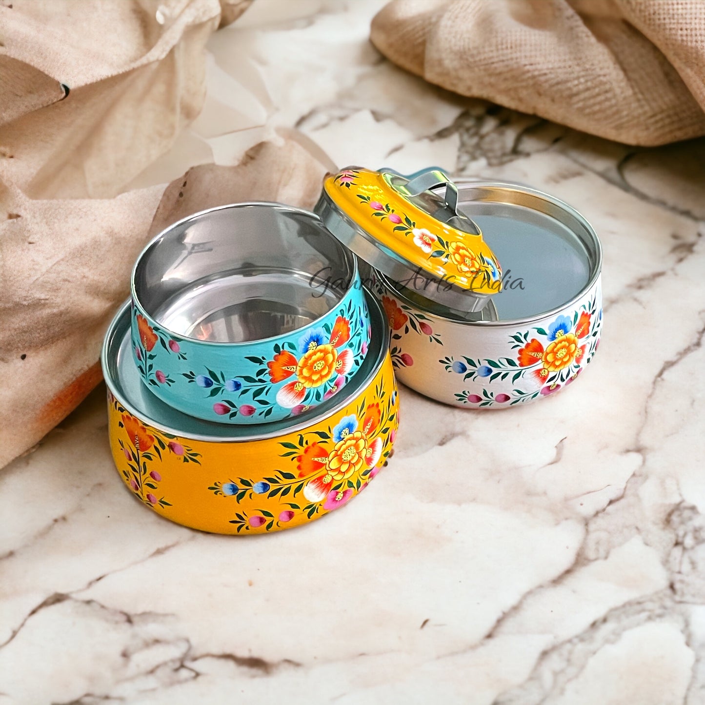 Hand-painted stainless steel tiffin carrier combines durability with artistic charm, making it a thoughtful gift for family or friends
