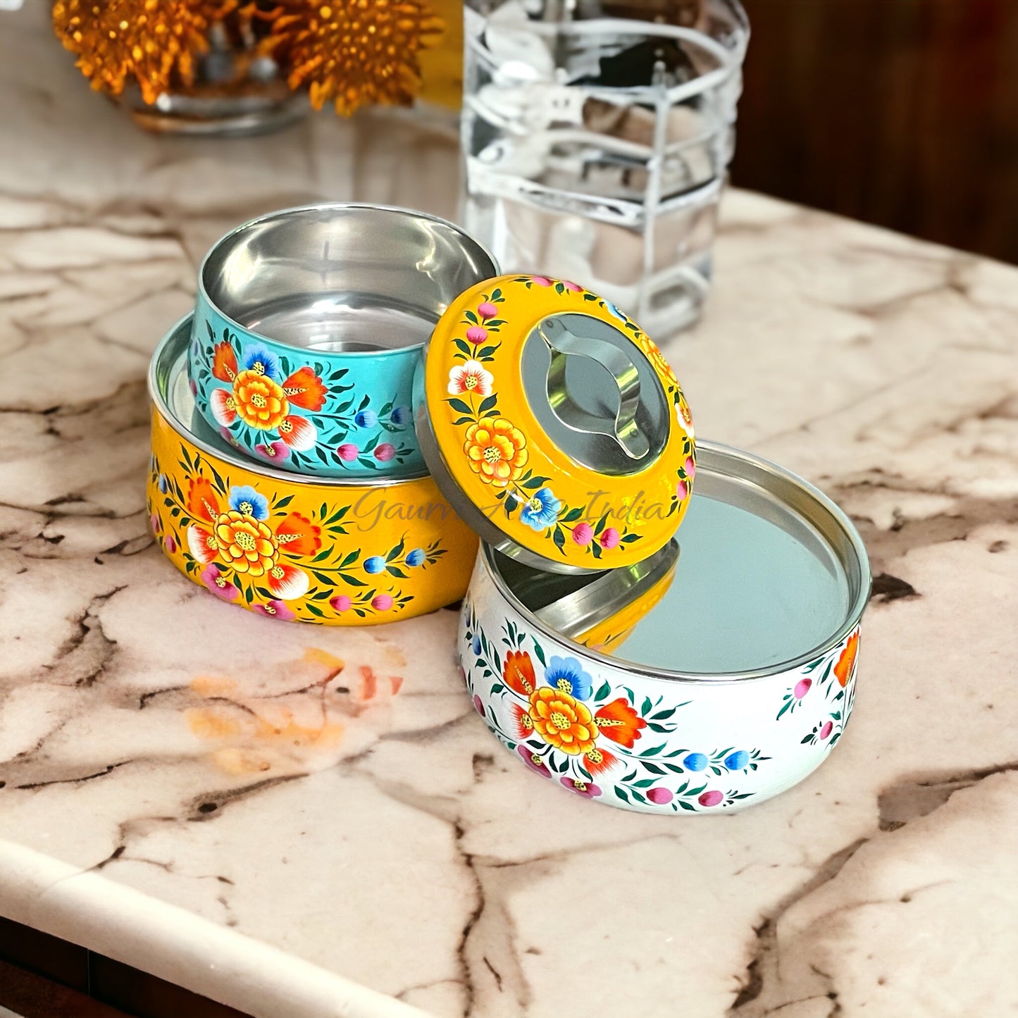Hand-painted stainless steel tiffin carrier combines durability with artistic charm, making it a thoughtful gift for family or friends