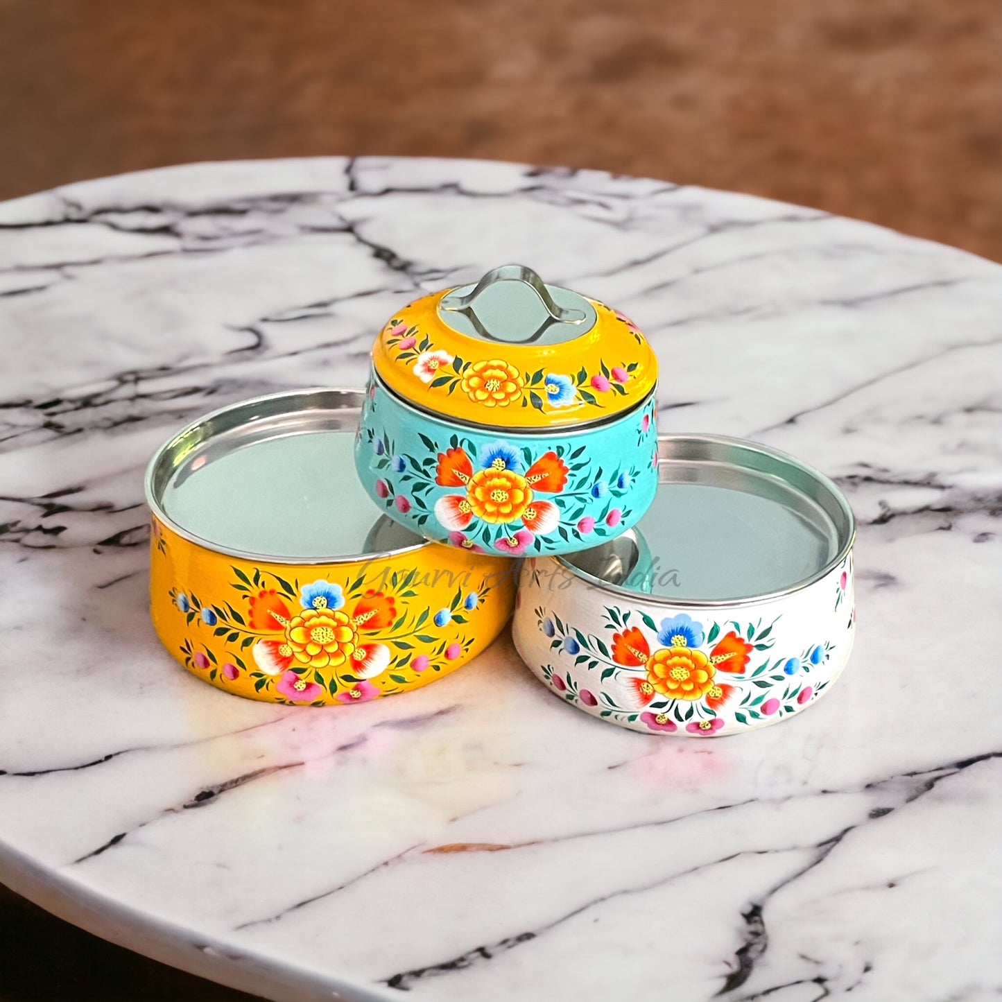 Hand-painted stainless steel tiffin carrier combines durability with artistic charm, making it a thoughtful gift for family or friends