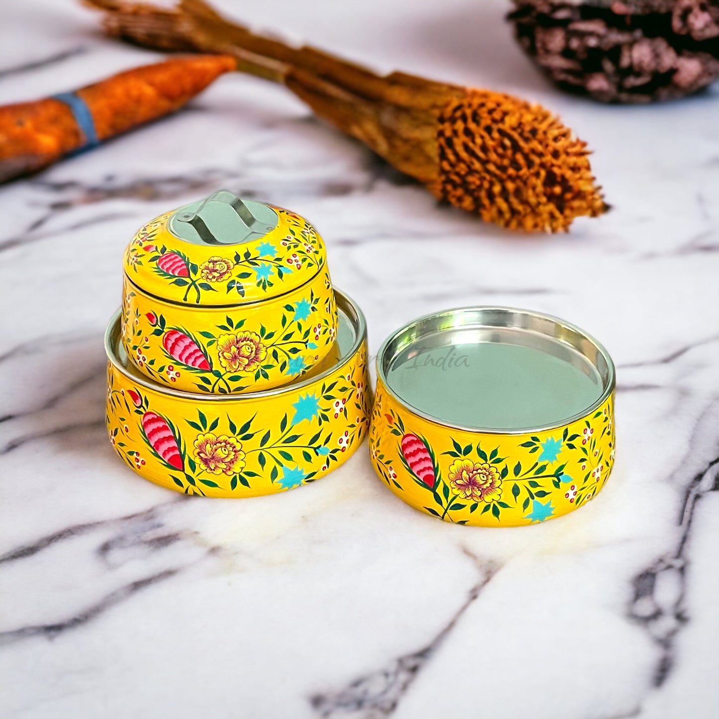 Hand-painted stainless steel tiffin carrier combines durability with artistic charm, making it a thoughtful gift for family or friends
