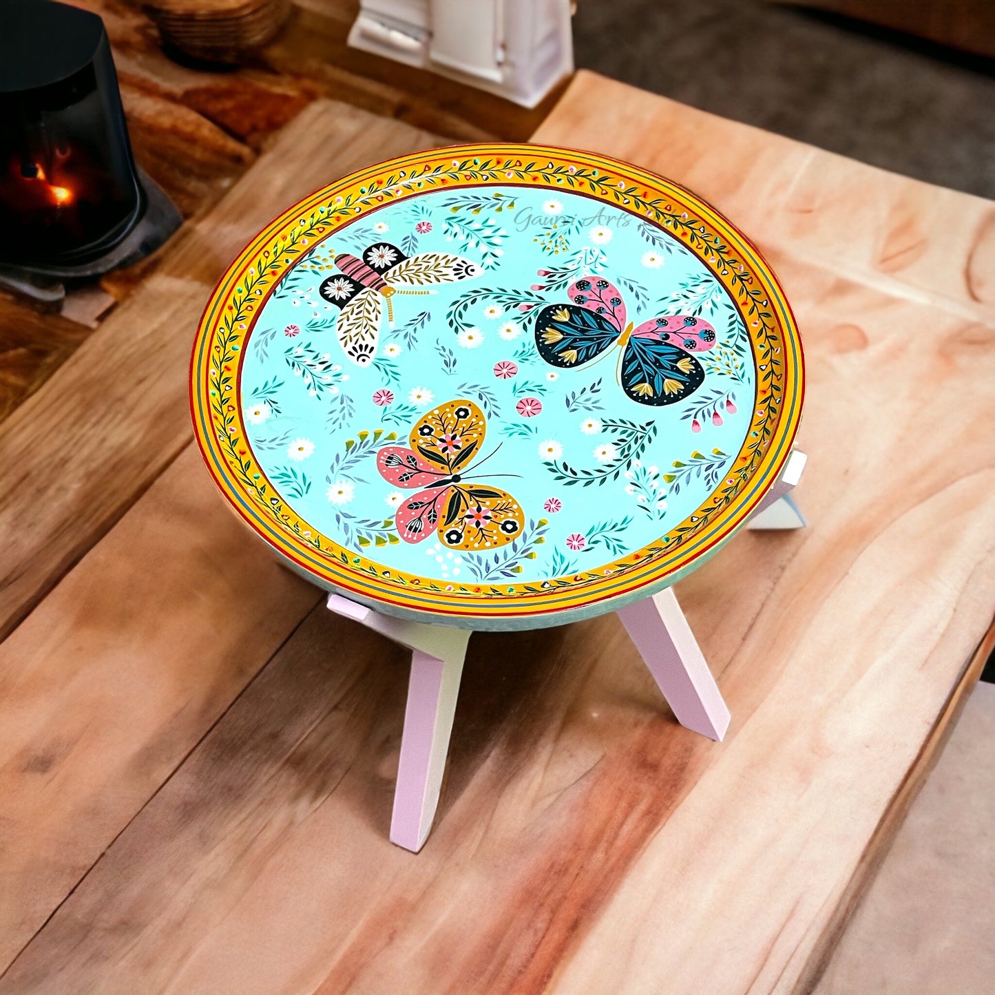 Elevate your living space with this exquisite Wooden Hand Painted Coffee Peg Table, making it an ideal centerpiece for your coffee moments.