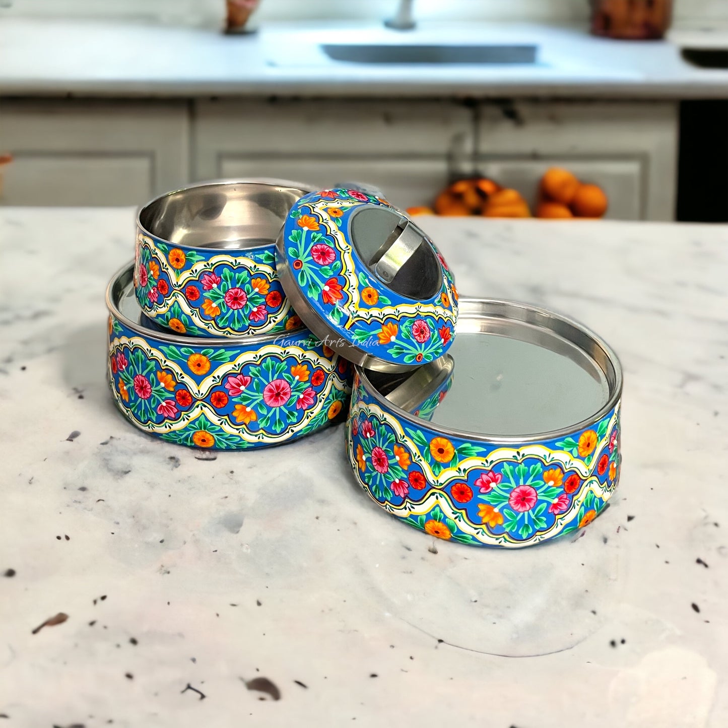 Hand-painted stainless steel tiffin carrier combines durability with artistic charm, making it a thoughtful gift for family or friends