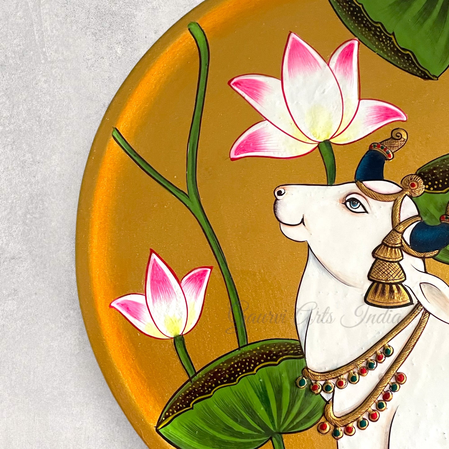 Enhance your home decor with this exquisite Pichwai Hanging Wall Plate. Crafted with traditional artistry, it brings a touch of cultural elegance and vibrant charm to any space.