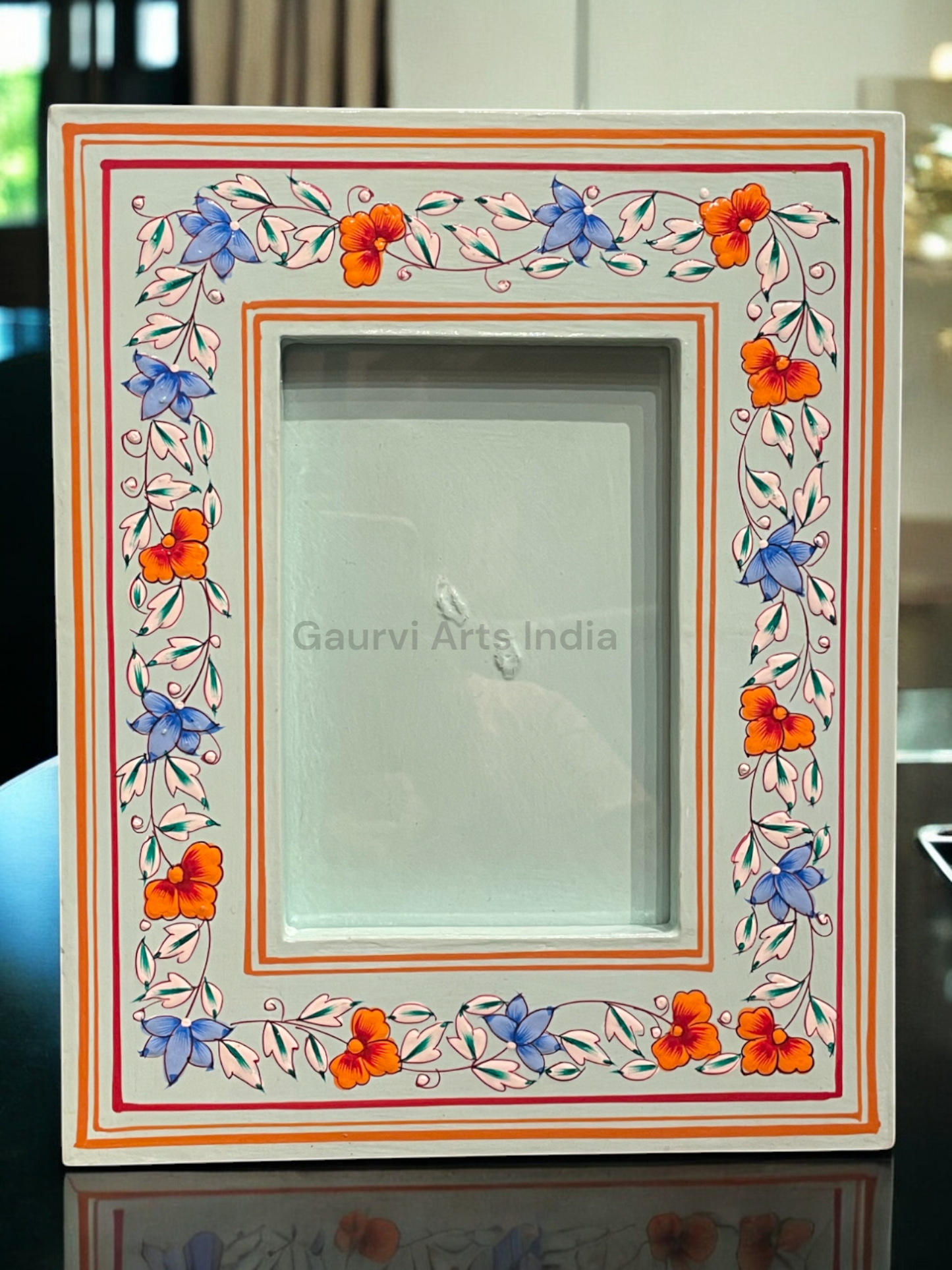 Hand-painted wooden photo frame adds a warm, artistic touch to your cherished memories