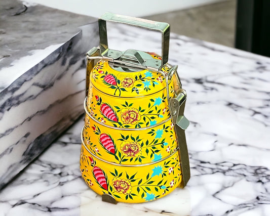 Hand-painted stainless steel tiffin carrier combines durability with artistic charm, making it a thoughtful gift for family or friends