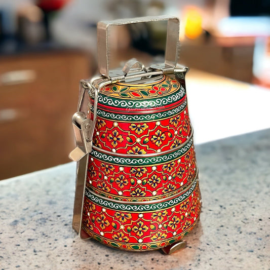 Hand-painted stainless steel tiffin carrier combines durability with artistic charm, making it a thoughtful gift for family or friends