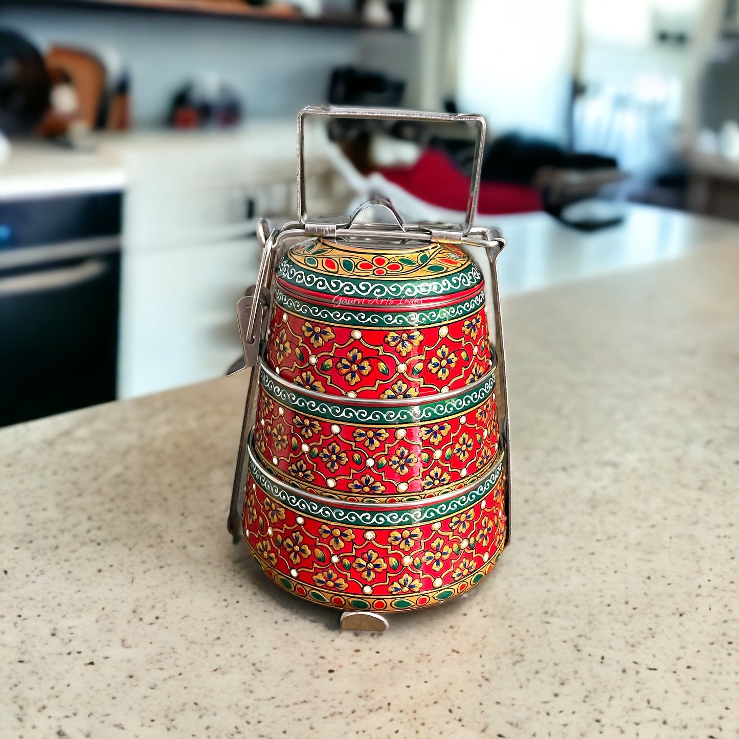 Hand-painted stainless steel tiffin carrier combines durability with artistic charm, making it a thoughtful gift for family or friends