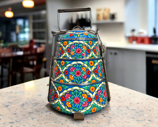 Hand-painted stainless steel tiffin carrier combines durability with artistic charm, making it a thoughtful gift for family or friends