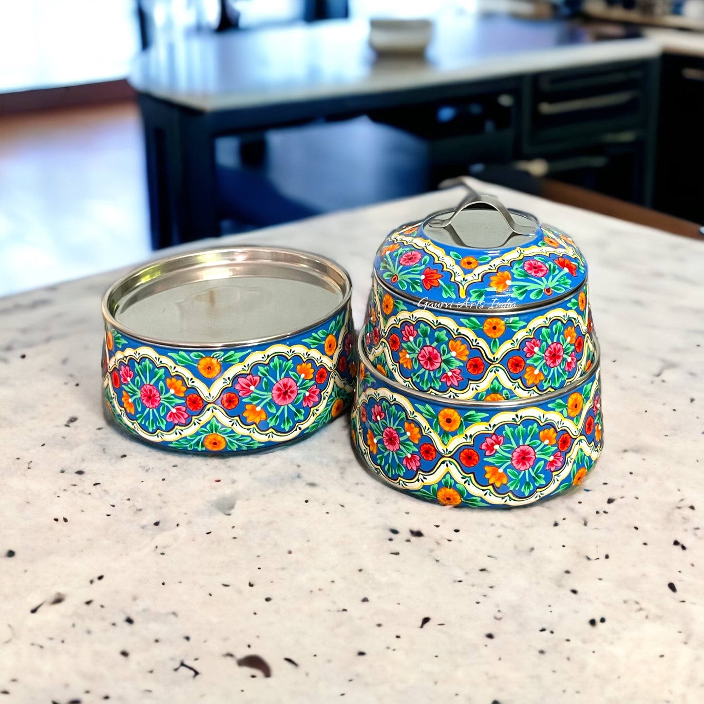 Hand-painted stainless steel tiffin carrier combines durability with artistic charm, making it a thoughtful gift for family or friends